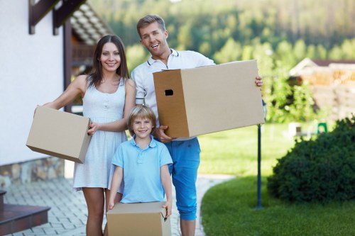 Movers carefully handling fragile items