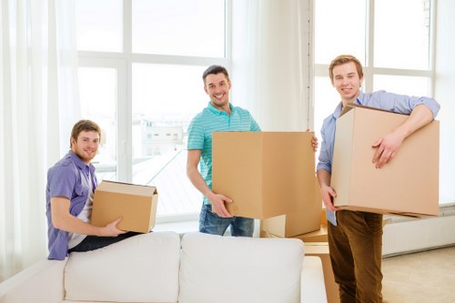 Movers efficiently handling household items